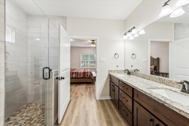 Exceptional 3-bed, 2.5-bath custom home on 2 lots in the gated on The Falls Resort and Club in Texas - for sale on GolfHomes.com, golf home, golf lot