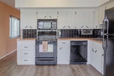 PRICED REDUCED!   Desirable 1,400 sq ft end unit, 2 bed/2 bath on On Top Of The World Golf Course in Florida - for sale on GolfHomes.com, golf home, golf lot