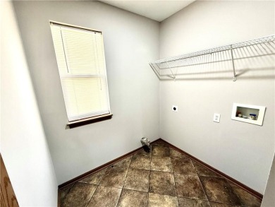 This spacious half-duplex in Golf View Villas features both on Teetering Rocks Links in Missouri - for sale on GolfHomes.com, golf home, golf lot
