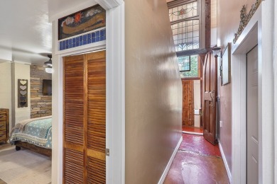 This is a beautifully updated 3-bed, 2-bath Spanish-style home on Alpine Golf Course in Texas - for sale on GolfHomes.com, golf home, golf lot