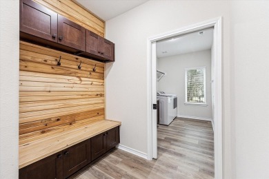 Exceptional 3-bed, 2.5-bath custom home on 2 lots in the gated on The Falls Resort and Club in Texas - for sale on GolfHomes.com, golf home, golf lot