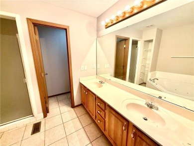 This spacious half-duplex in Golf View Villas features both on Teetering Rocks Links in Missouri - for sale on GolfHomes.com, golf home, golf lot