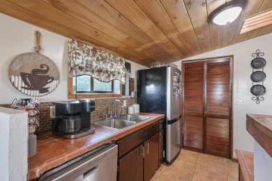 This is a beautifully updated 3-bed, 2-bath Spanish-style home on Alpine Golf Course in Texas - for sale on GolfHomes.com, golf home, golf lot