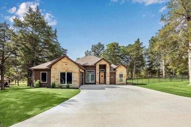 Exceptional 3-bed, 2.5-bath custom home on 2 lots in the gated on The Falls Resort and Club in Texas - for sale on GolfHomes.com, golf home, golf lot