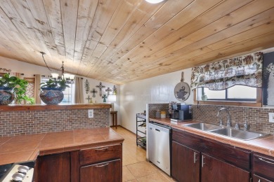 This is a beautifully updated 3-bed, 2-bath Spanish-style home on Alpine Golf Course in Texas - for sale on GolfHomes.com, golf home, golf lot