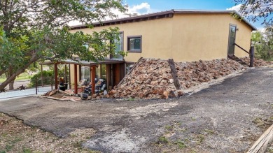 This is a beautifully updated 3-bed, 2-bath Spanish-style home on Alpine Golf Course in Texas - for sale on GolfHomes.com, golf home, golf lot