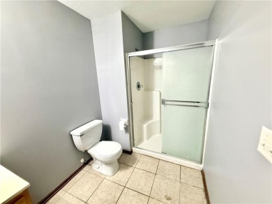 This spacious half-duplex in Golf View Villas features both on Teetering Rocks Links in Missouri - for sale on GolfHomes.com, golf home, golf lot