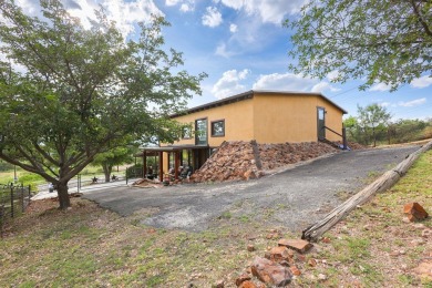 This is a beautifully updated 3-bed, 2-bath Spanish-style home on Alpine Golf Course in Texas - for sale on GolfHomes.com, golf home, golf lot