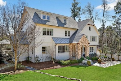 Nestled on a quiet cul-de-sac just moments from Chastain Park on North Fulton Golf Course in Georgia - for sale on GolfHomes.com, golf home, golf lot