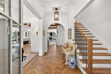 Nestled on a quiet cul-de-sac just moments from Chastain Park on North Fulton Golf Course in Georgia - for sale on GolfHomes.com, golf home, golf lot