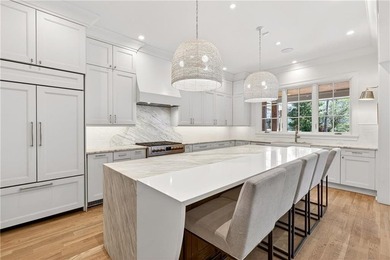 Nestled on a quiet cul-de-sac just moments from Chastain Park on North Fulton Golf Course in Georgia - for sale on GolfHomes.com, golf home, golf lot