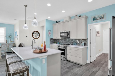 Beautiful Turn-Key Camellia Cottage offering 2 bedrooms, 2 baths on LPGA International Golf Course in Florida - for sale on GolfHomes.com, golf home, golf lot