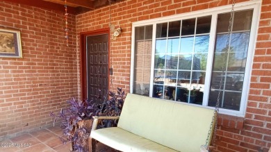This charming solid brick home sits on a coveted 0.30-acre on Randolph Park Golf Courses in Arizona - for sale on GolfHomes.com, golf home, golf lot