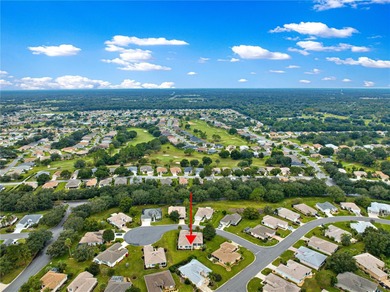 Luxurious Hampton model boasts French glass double French doors on Eagle Ridge At Spruce Creek Country Club in Florida - for sale on GolfHomes.com, golf home, golf lot
