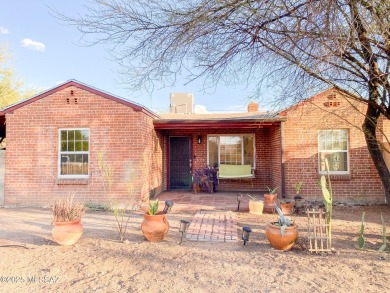 This charming solid brick home sits on a coveted 0.30-acre on Randolph Park Golf Courses in Arizona - for sale on GolfHomes.com, golf home, golf lot