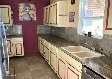 This charming solid brick home sits on a coveted 0.30-acre on Randolph Park Golf Courses in Arizona - for sale on GolfHomes.com, golf home, golf lot