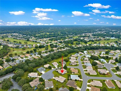 Luxurious Hampton model boasts French glass double French doors on Eagle Ridge At Spruce Creek Country Club in Florida - for sale on GolfHomes.com, golf home, golf lot