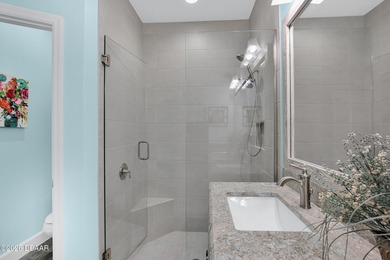 Beautiful Turn-Key Camellia Cottage offering 2 bedrooms, 2 baths on LPGA International Golf Course in Florida - for sale on GolfHomes.com, golf home, golf lot