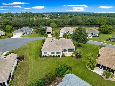 Luxurious Hampton model boasts French glass double French doors on Eagle Ridge At Spruce Creek Country Club in Florida - for sale on GolfHomes.com, golf home, golf lot