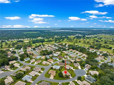 Luxurious Hampton model boasts French glass double French doors on Eagle Ridge At Spruce Creek Country Club in Florida - for sale on GolfHomes.com, golf home, golf lot