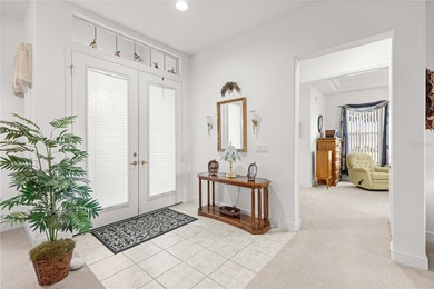 Luxurious Hampton model boasts French glass double French doors on Eagle Ridge At Spruce Creek Country Club in Florida - for sale on GolfHomes.com, golf home, golf lot