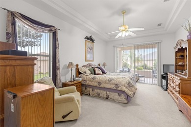 Luxurious Hampton model boasts French glass double French doors on Eagle Ridge At Spruce Creek Country Club in Florida - for sale on GolfHomes.com, golf home, golf lot