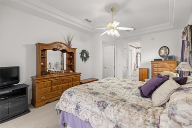 Luxurious Hampton model boasts French glass double French doors on Eagle Ridge At Spruce Creek Country Club in Florida - for sale on GolfHomes.com, golf home, golf lot