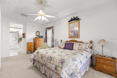 Luxurious Hampton model boasts French glass double French doors on Eagle Ridge At Spruce Creek Country Club in Florida - for sale on GolfHomes.com, golf home, golf lot