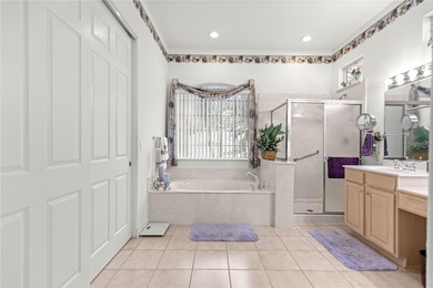 Luxurious Hampton model boasts French glass double French doors on Eagle Ridge At Spruce Creek Country Club in Florida - for sale on GolfHomes.com, golf home, golf lot