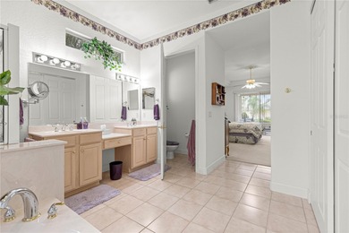 Luxurious Hampton model boasts French glass double French doors on Eagle Ridge At Spruce Creek Country Club in Florida - for sale on GolfHomes.com, golf home, golf lot