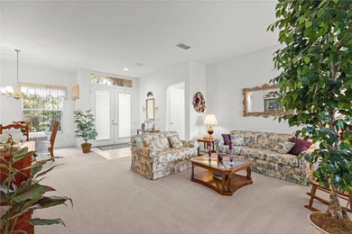 Luxurious Hampton model boasts French glass double French doors on Eagle Ridge At Spruce Creek Country Club in Florida - for sale on GolfHomes.com, golf home, golf lot