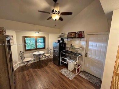 This 1940's Cottage-Style 4/3 Home is truly one of a kind in the on Lake Worth Municipal Golf Course in Florida - for sale on GolfHomes.com, golf home, golf lot