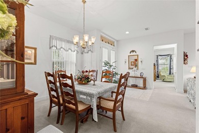 Luxurious Hampton model boasts French glass double French doors on Eagle Ridge At Spruce Creek Country Club in Florida - for sale on GolfHomes.com, golf home, golf lot