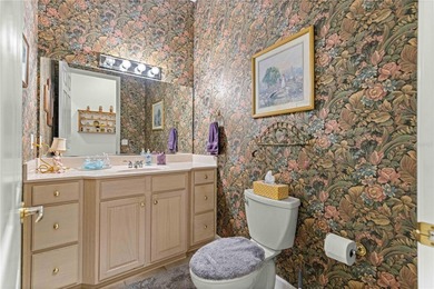 Luxurious Hampton model boasts French glass double French doors on Eagle Ridge At Spruce Creek Country Club in Florida - for sale on GolfHomes.com, golf home, golf lot