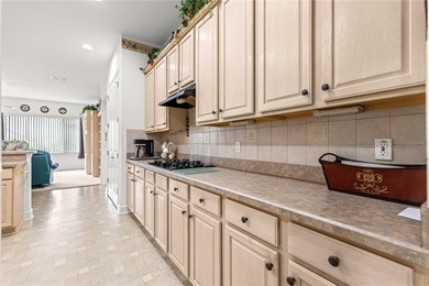 Luxurious Hampton model boasts French glass double French doors on Eagle Ridge At Spruce Creek Country Club in Florida - for sale on GolfHomes.com, golf home, golf lot