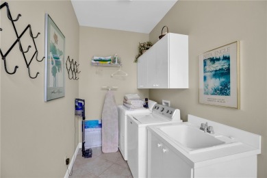 Expansive one level Harbor Links with tremendous family room and on Grand Harbor Golf and Country Club in Florida - for sale on GolfHomes.com, golf home, golf lot