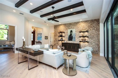 This Sanctuary home is ideally located on desirable Baltusrol Ct on The Sanctuary Golf Club in Florida - for sale on GolfHomes.com, golf home, golf lot