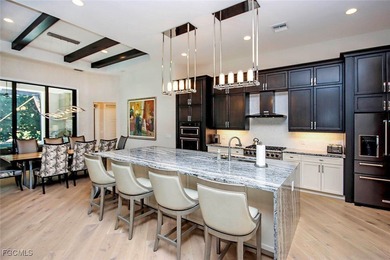 This Sanctuary home is ideally located on desirable Baltusrol Ct on The Sanctuary Golf Club in Florida - for sale on GolfHomes.com, golf home, golf lot