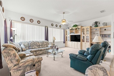 Luxurious Hampton model boasts French glass double French doors on Eagle Ridge At Spruce Creek Country Club in Florida - for sale on GolfHomes.com, golf home, golf lot