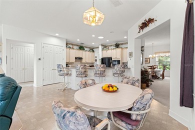 Luxurious Hampton model boasts French glass double French doors on Eagle Ridge At Spruce Creek Country Club in Florida - for sale on GolfHomes.com, golf home, golf lot