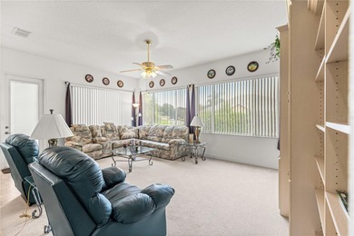 Luxurious Hampton model boasts French glass double French doors on Eagle Ridge At Spruce Creek Country Club in Florida - for sale on GolfHomes.com, golf home, golf lot
