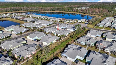 Beautiful Turn-Key Camellia Cottage offering 2 bedrooms, 2 baths on LPGA International Golf Course in Florida - for sale on GolfHomes.com, golf home, golf lot