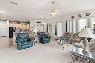 Luxurious Hampton model boasts French glass double French doors on Eagle Ridge At Spruce Creek Country Club in Florida - for sale on GolfHomes.com, golf home, golf lot