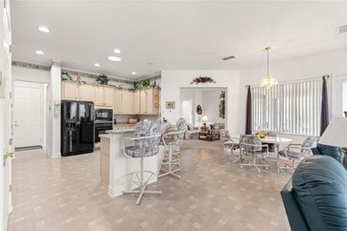 Luxurious Hampton model boasts French glass double French doors on Eagle Ridge At Spruce Creek Country Club in Florida - for sale on GolfHomes.com, golf home, golf lot