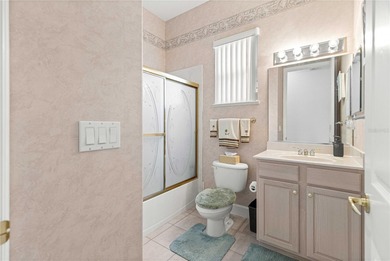 Luxurious Hampton model boasts French glass double French doors on Eagle Ridge At Spruce Creek Country Club in Florida - for sale on GolfHomes.com, golf home, golf lot