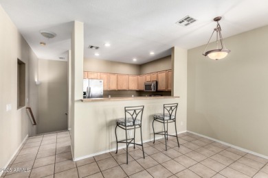 Your sweet condo home,  or home away from home,  awaits your on Royal Palms Golf Course in Arizona - for sale on GolfHomes.com, golf home, golf lot