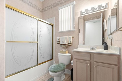 Luxurious Hampton model boasts French glass double French doors on Eagle Ridge At Spruce Creek Country Club in Florida - for sale on GolfHomes.com, golf home, golf lot