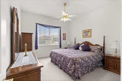 Luxurious Hampton model boasts French glass double French doors on Eagle Ridge At Spruce Creek Country Club in Florida - for sale on GolfHomes.com, golf home, golf lot