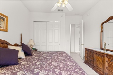 Luxurious Hampton model boasts French glass double French doors on Eagle Ridge At Spruce Creek Country Club in Florida - for sale on GolfHomes.com, golf home, golf lot