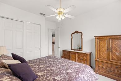 Luxurious Hampton model boasts French glass double French doors on Eagle Ridge At Spruce Creek Country Club in Florida - for sale on GolfHomes.com, golf home, golf lot